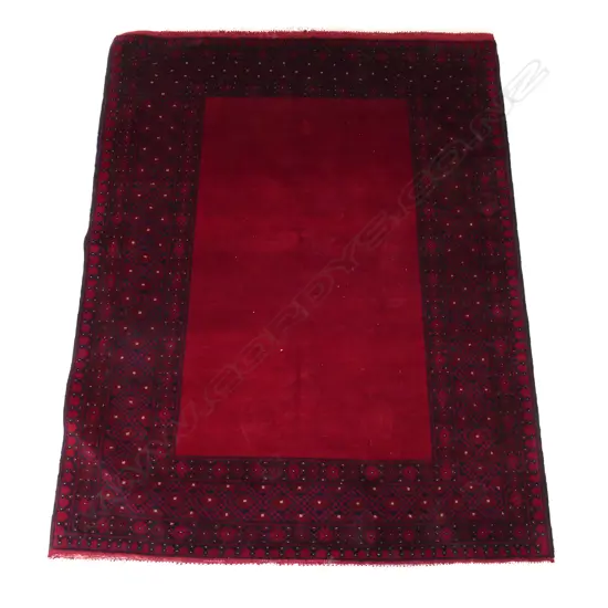 A hand knotted Turkman carpet