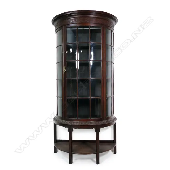 An Edwardian mahogany Chinese Chippendale style demi-lune display cabinet