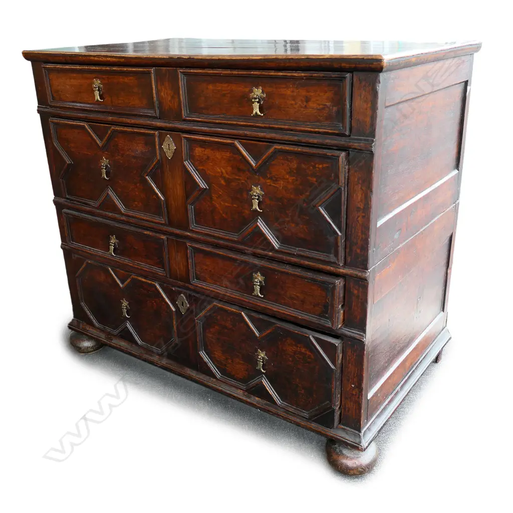 A William & Mary style four drawer country oak chest Image 1++