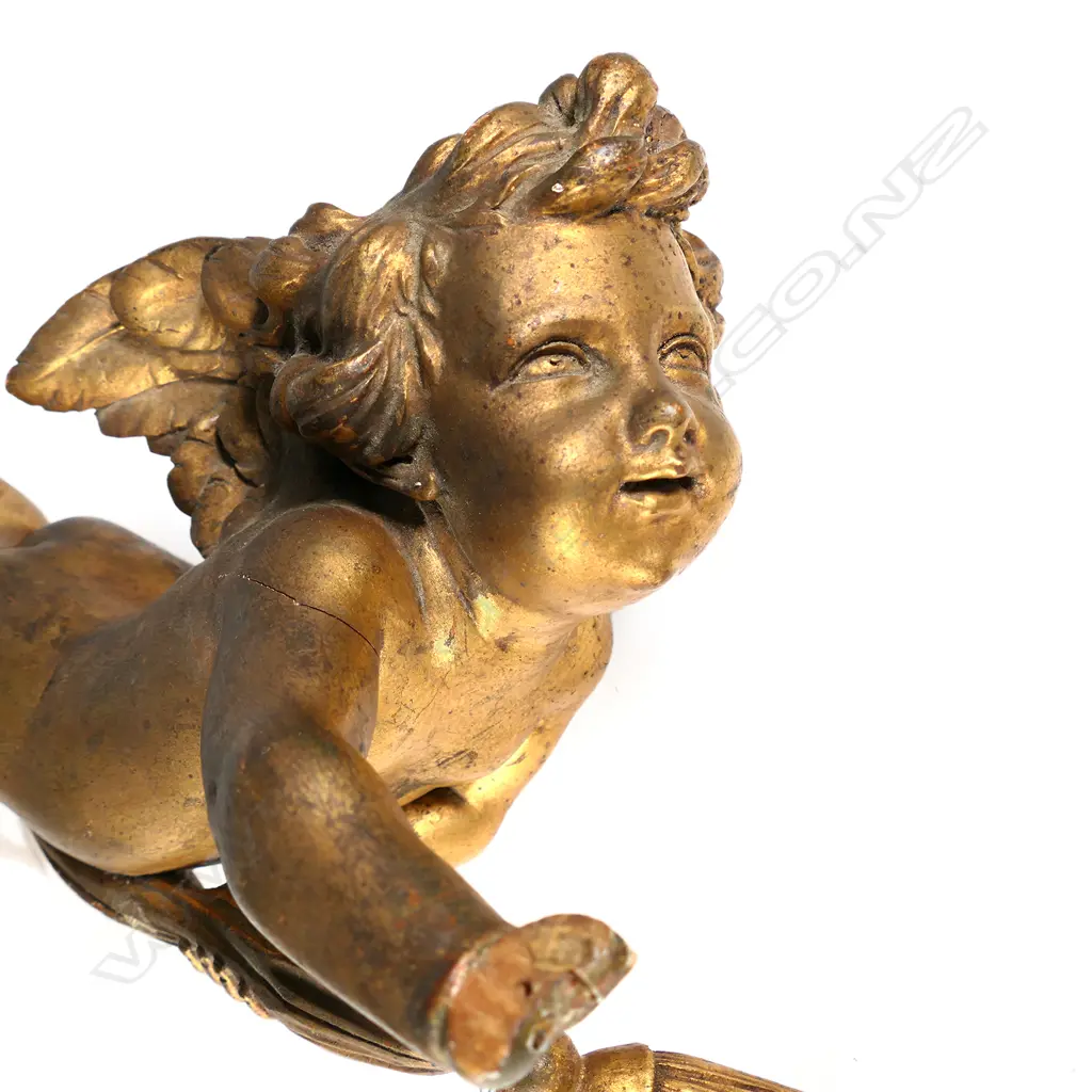 An antique carved giltwood hanging cherub light fitting Image 1++