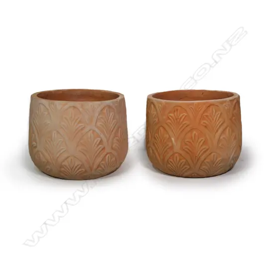 A pair of terracotta French style garden pots