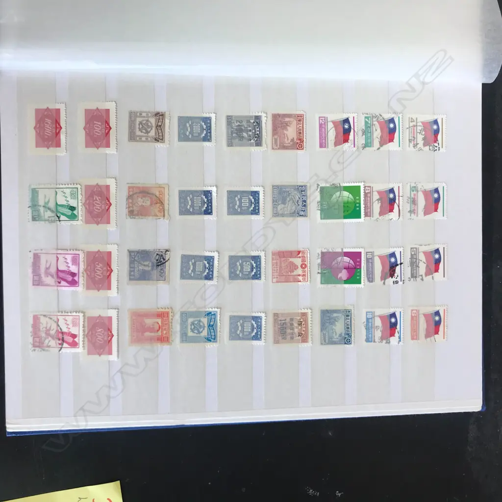 A Chinese stamp collection in album Image 1++