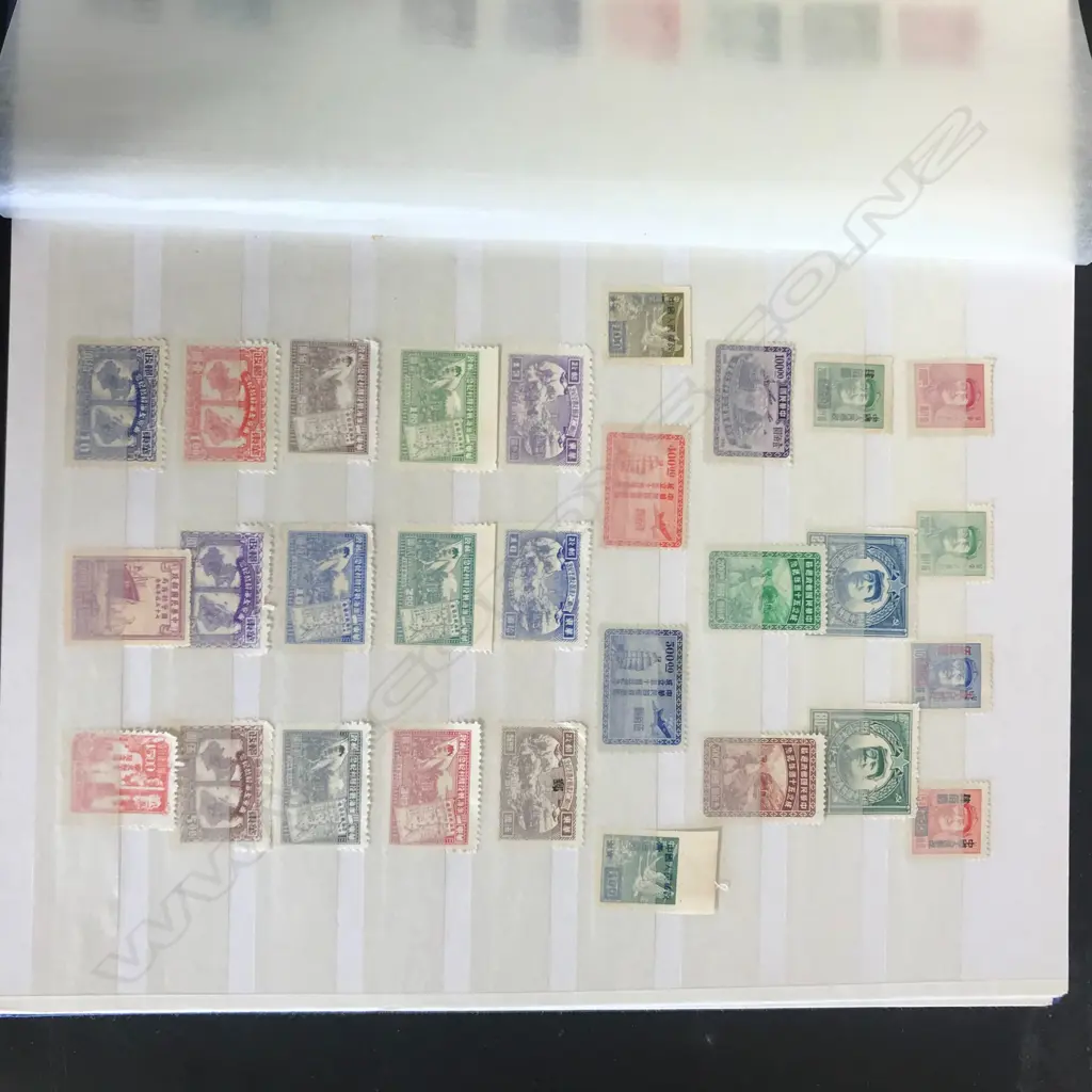 A Chinese stamp collection in album Image 1++