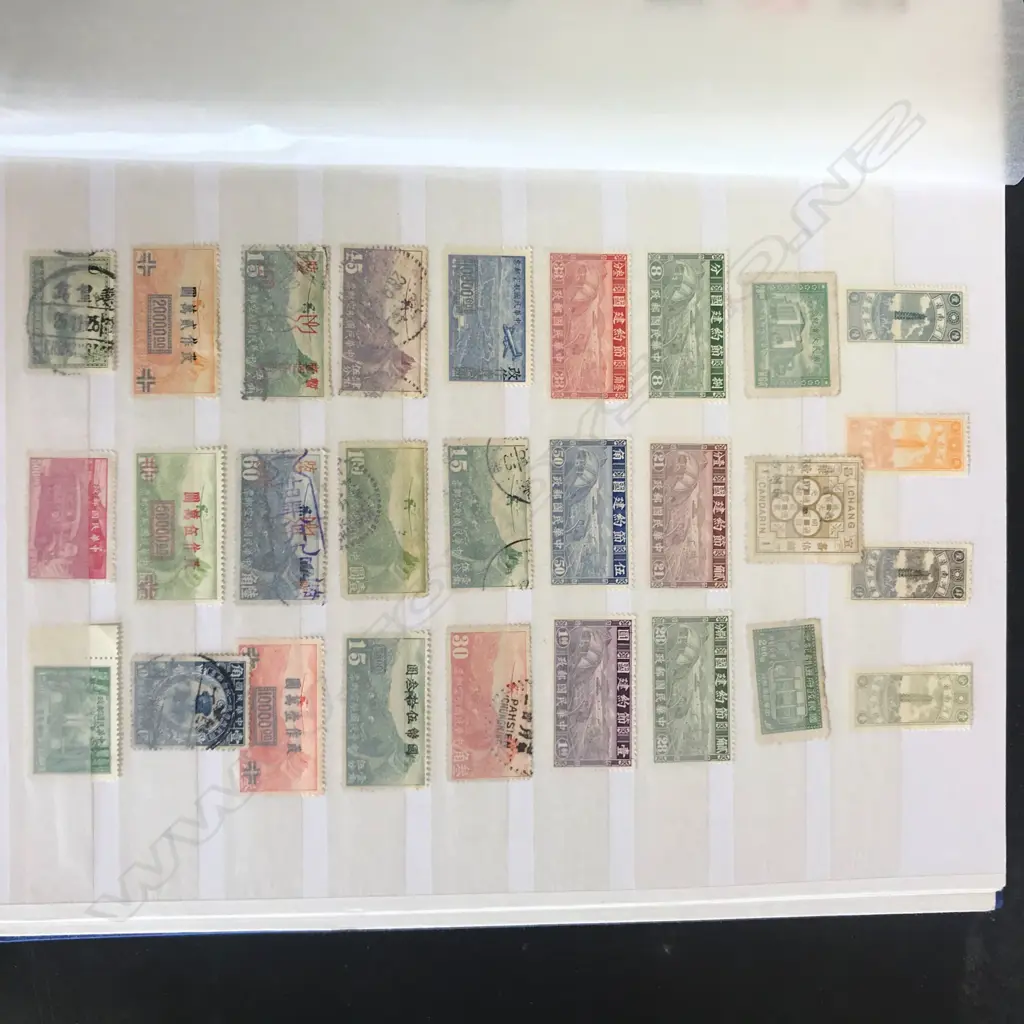 A Chinese stamp collection in album Image 1++
