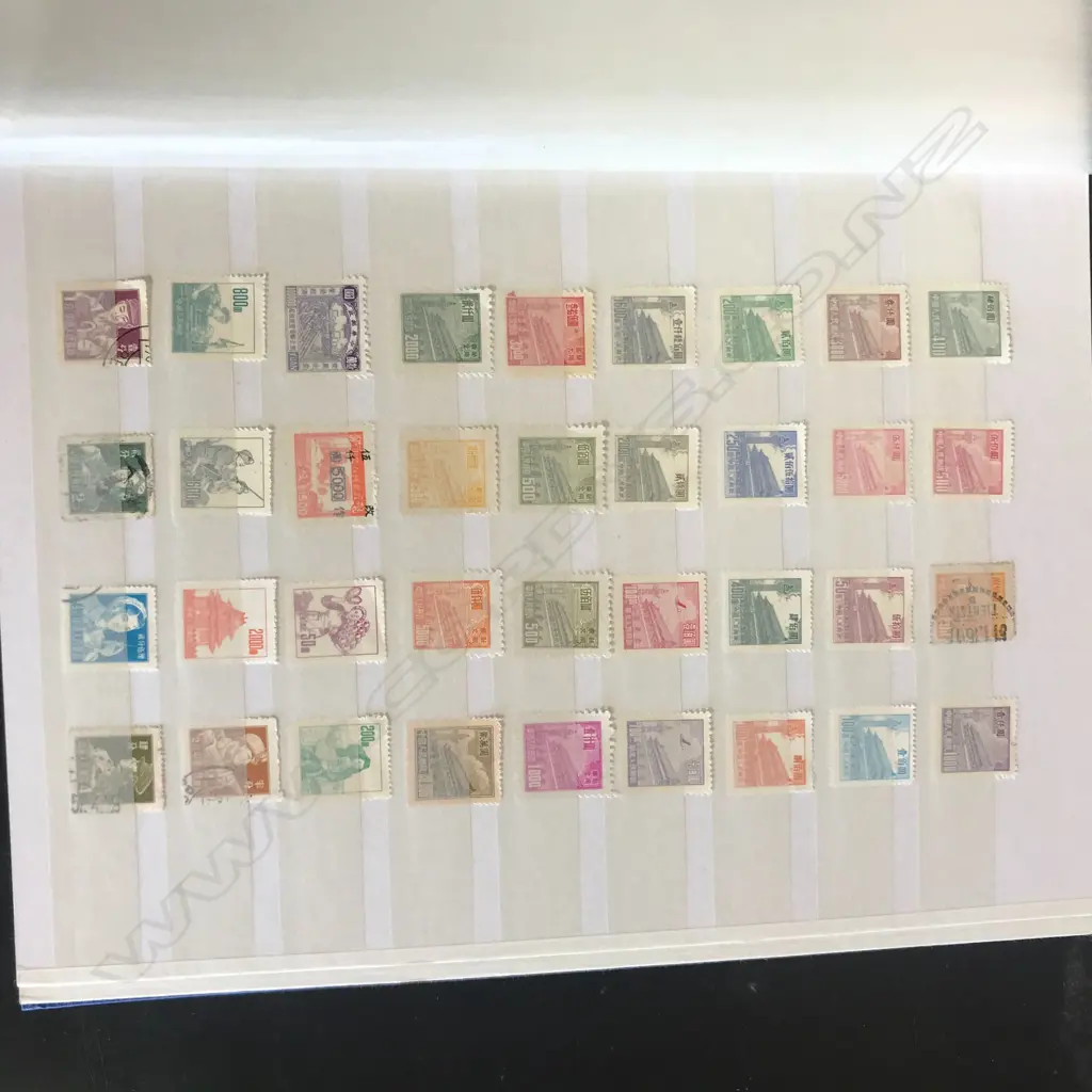 A Chinese stamp collection in album Image 1++