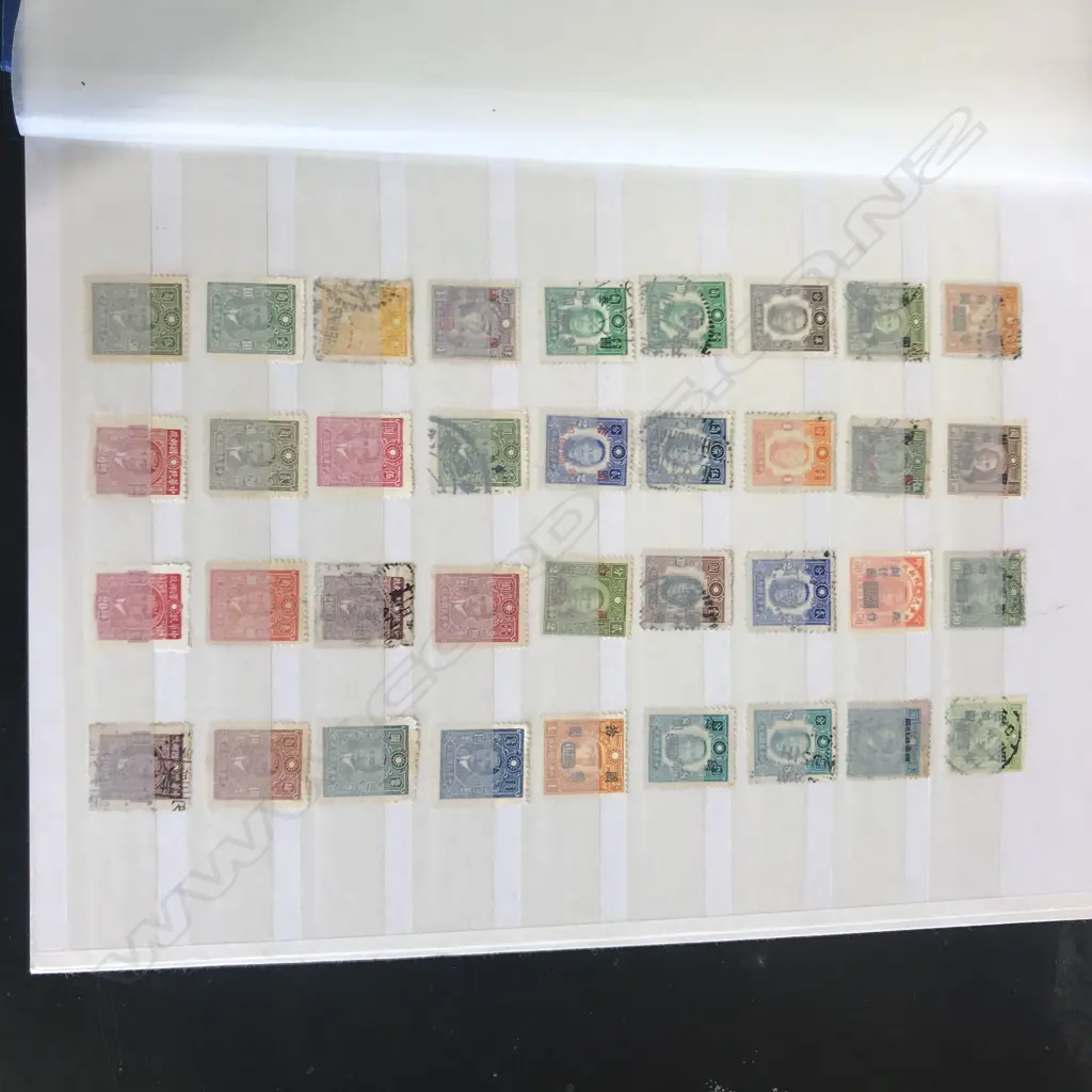 A Chinese stamp collection in album Image 1++