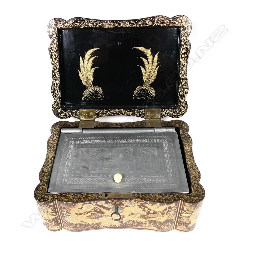 A Victorian lacquer tea caddy Image 1++