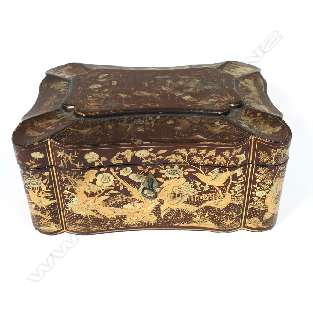 A Victorian lacquer tea caddy Image 1++