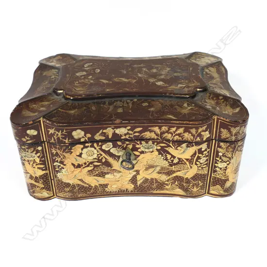 A Victorian lacquer tea caddy