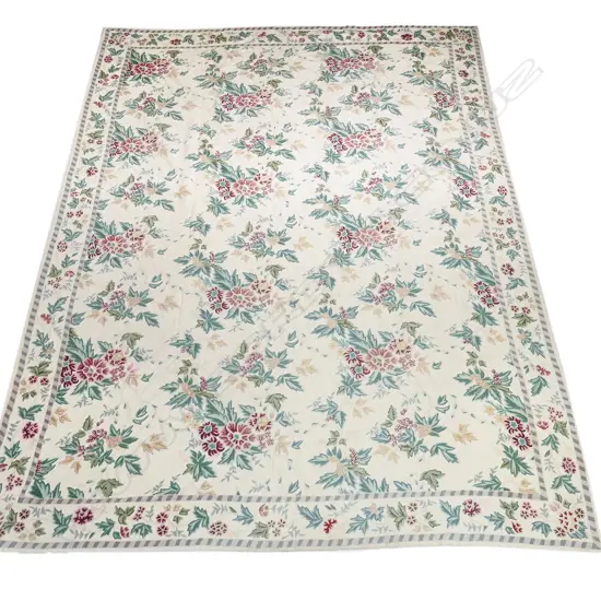 A vintage crewel work wall hanging