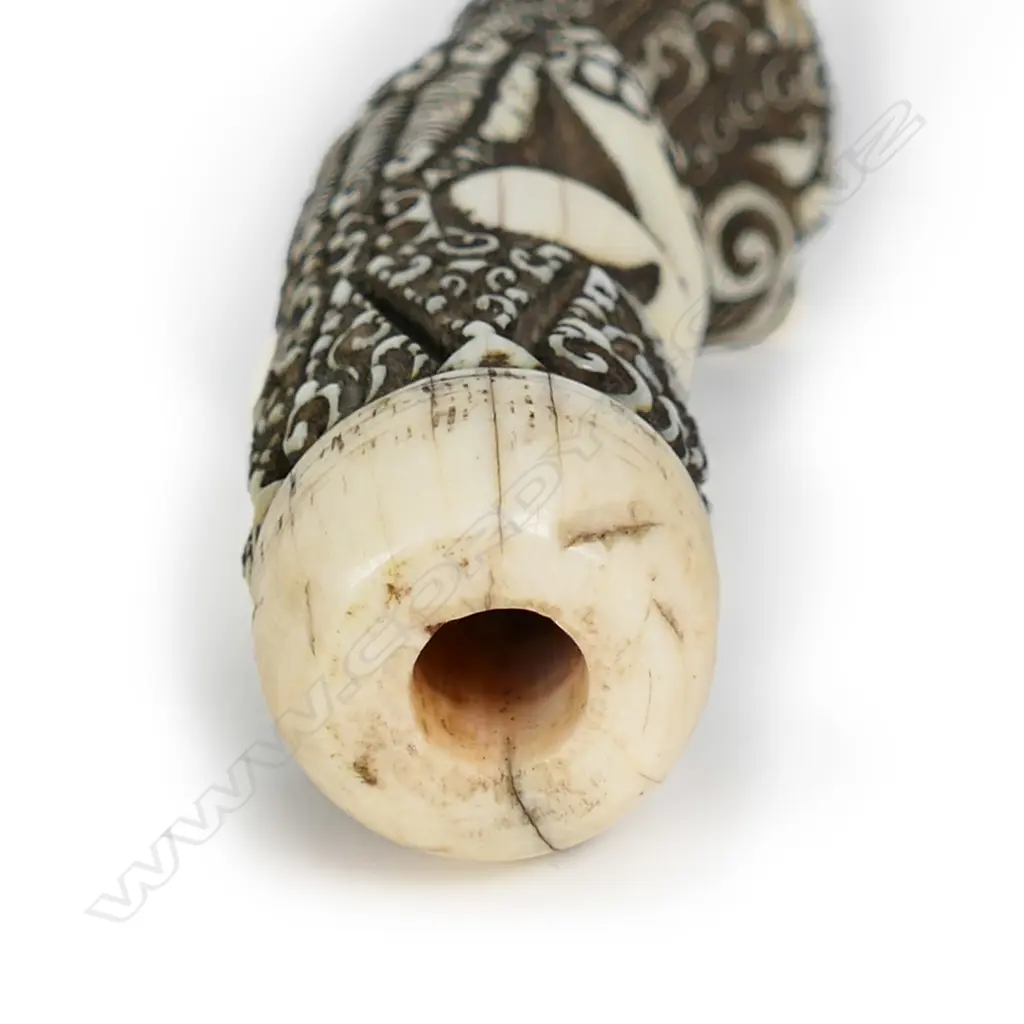 A 19thc finely carved ivory Indonesian figural kris handle Image 1++