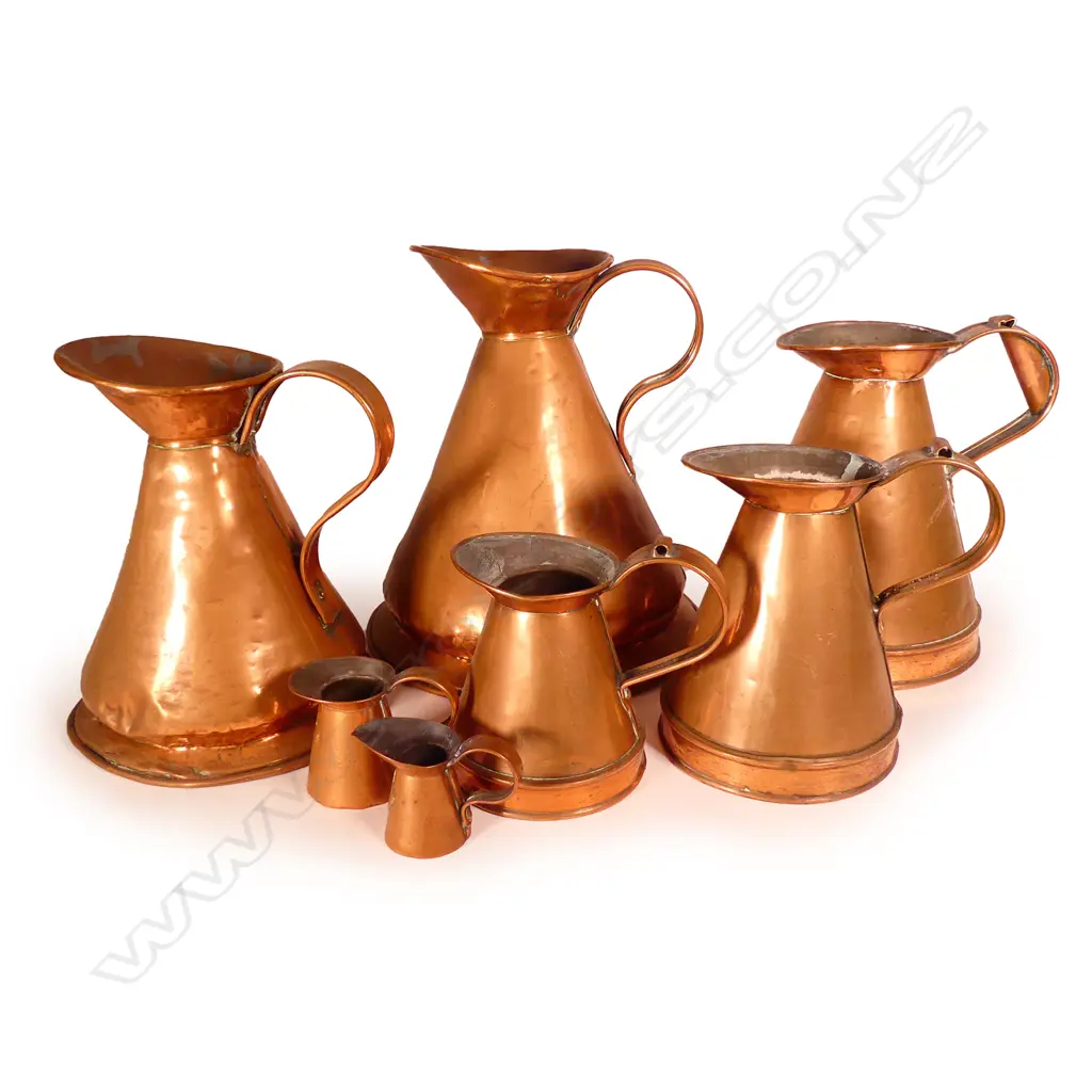 A collection of seven Victorian and Georgian copper graduated harvest measures Image 1++