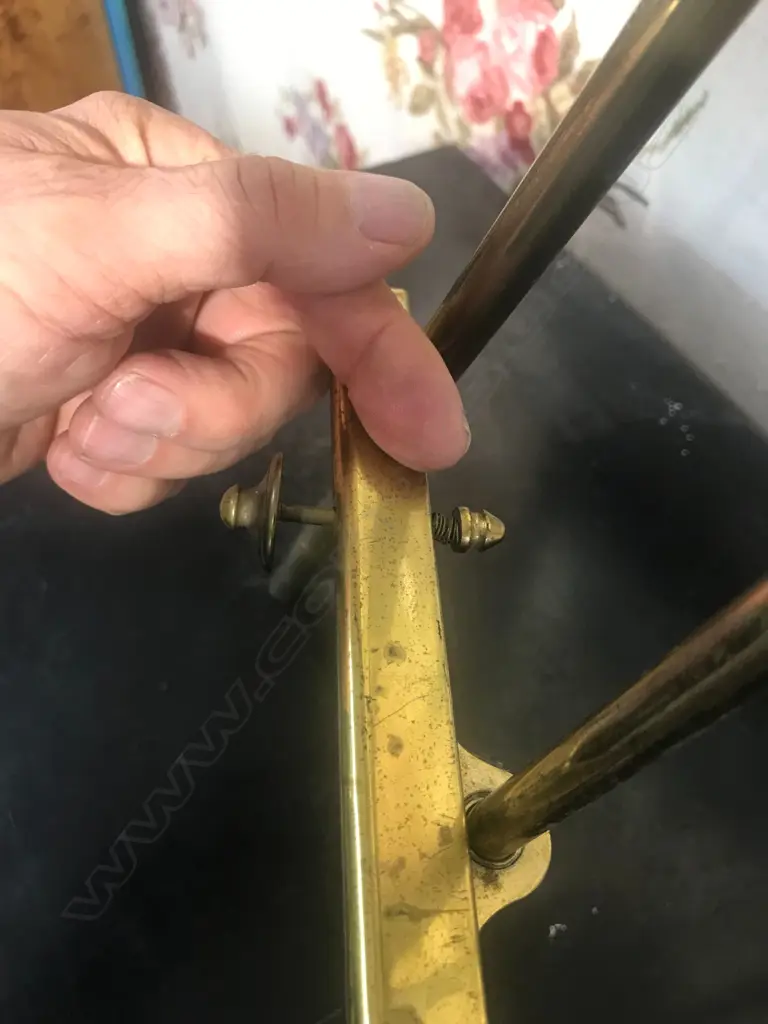 An antique brass table easel Image 1++