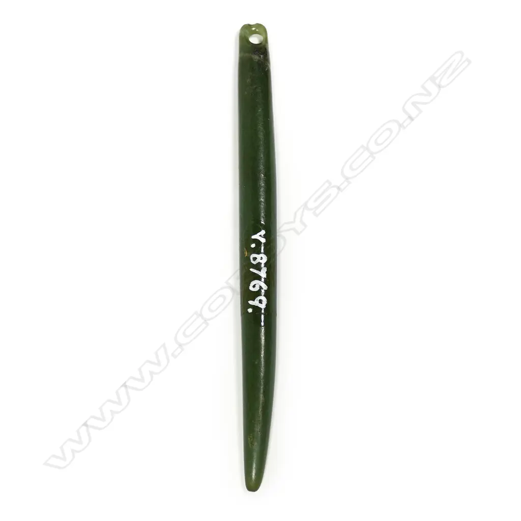 A pre-European Maori pounamu kuru pendant Image 1++