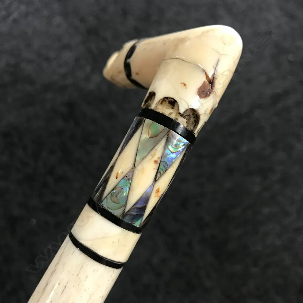 A late 19thC carved whalebone walking stick Image 1++