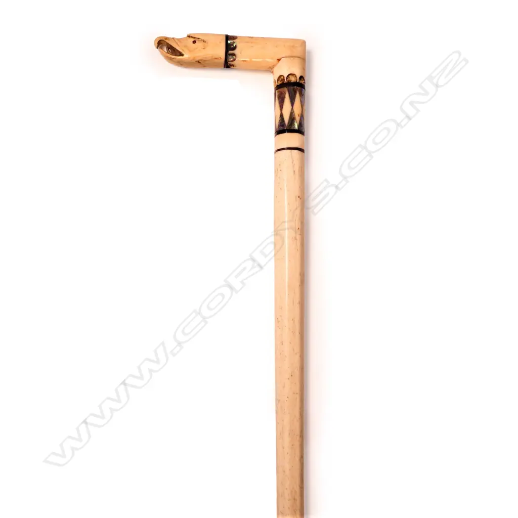 A late 19thC carved whalebone walking stick Image 1++