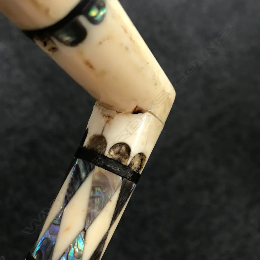 A late 19thC carved whalebone walking stick Image 1++