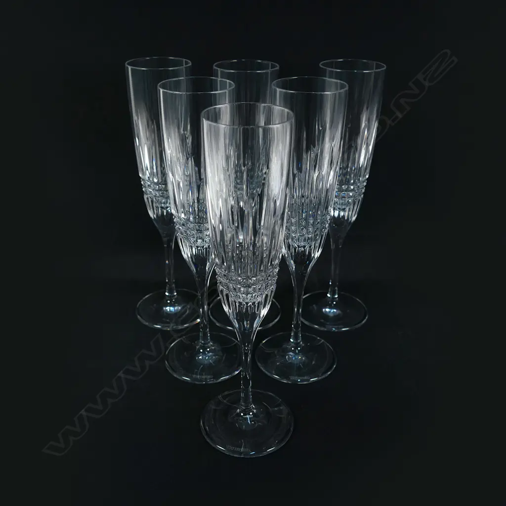 A set of six Waterford crystal champagne flutes Image 1++