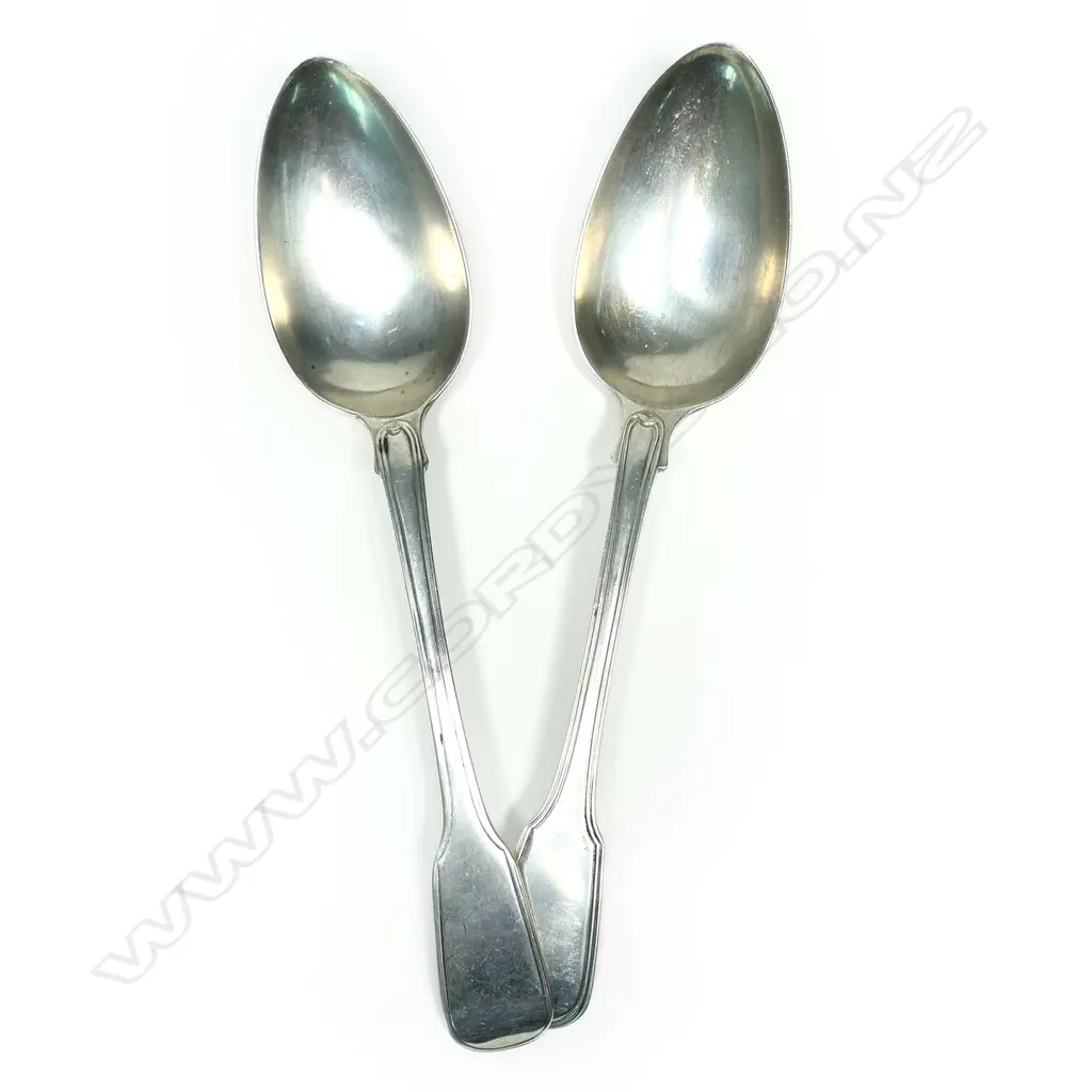 A near pair of Geo.III silver tablespoons Image 1++