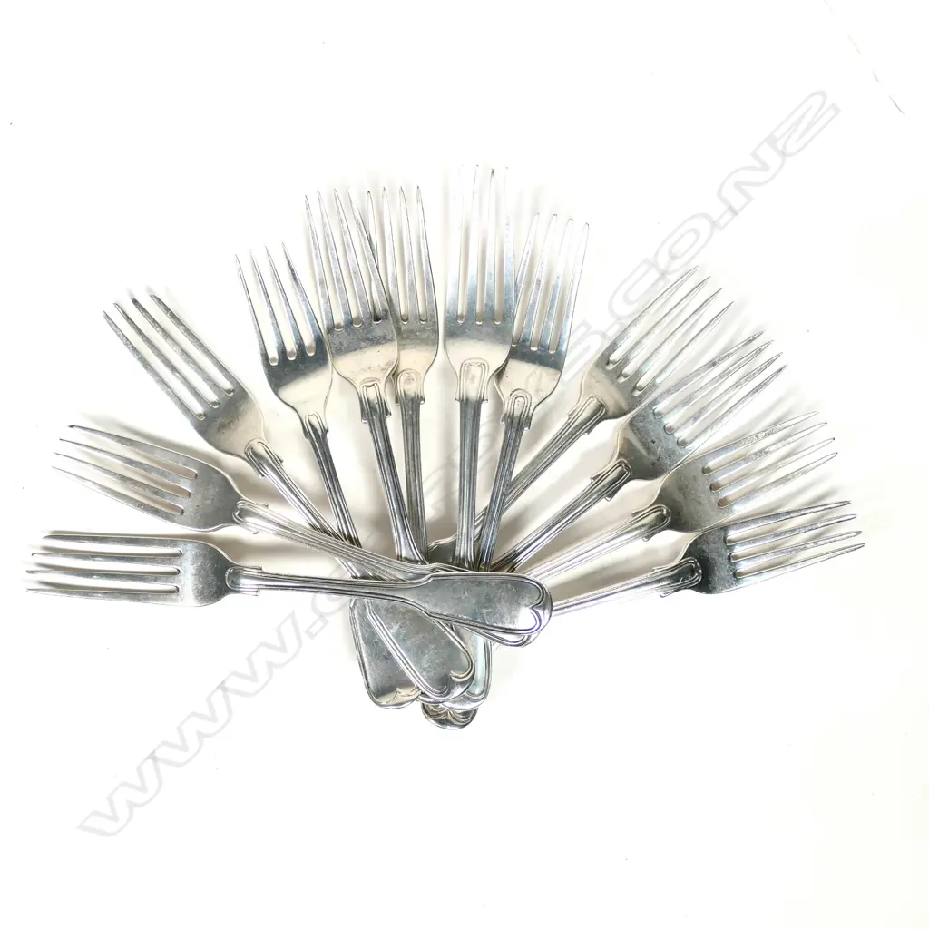 A mixed set of 12 c.1840 silver dessert forks Image 1++