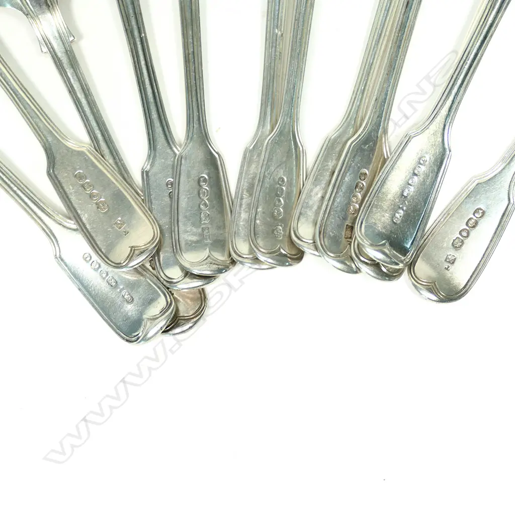 A mixed set of 12 c.1840 silver dessert spoons Image 1++