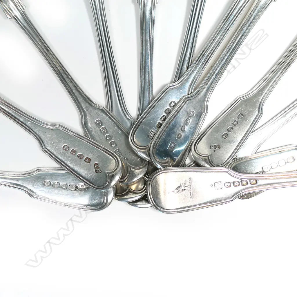 A mixed set of 12 Geo.III/IV silver dessert spoons Image 1++