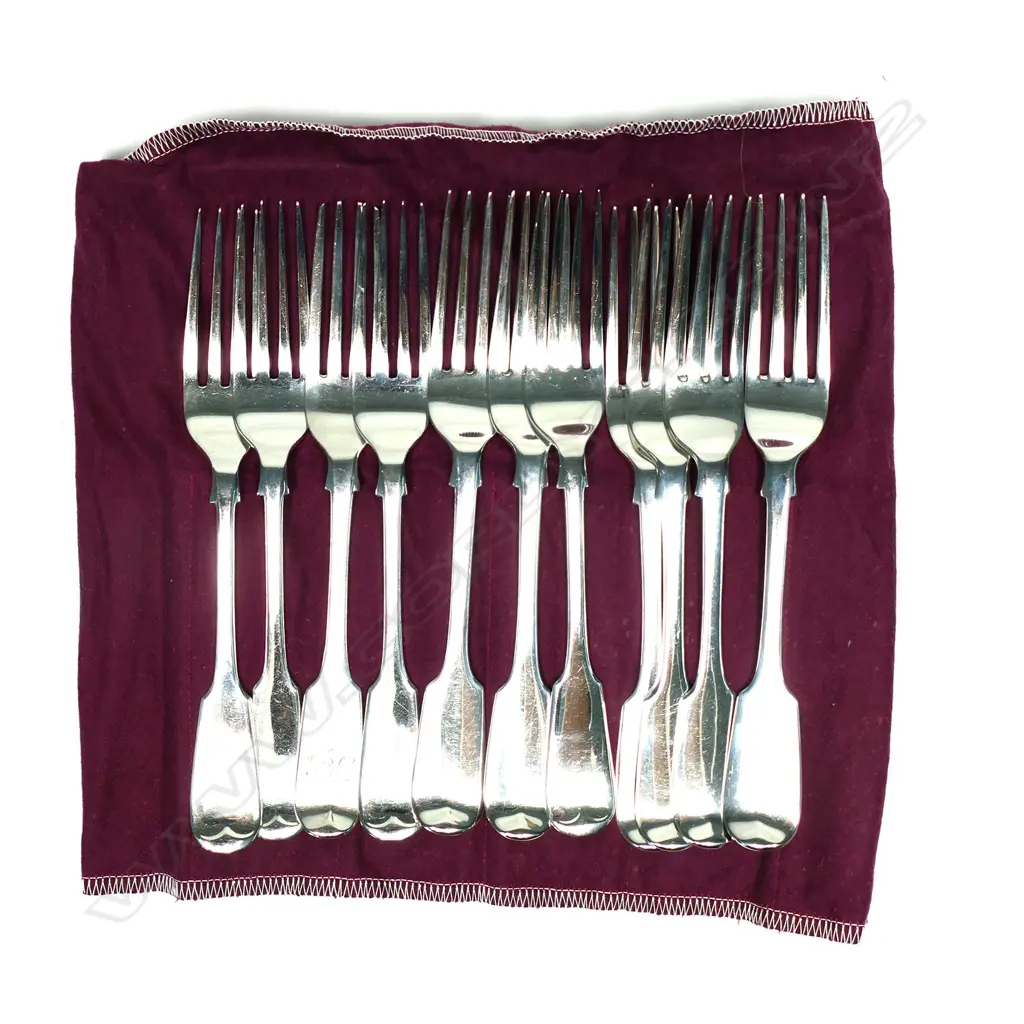 A mixed set of 11 Victorian silver table forks Image 1++