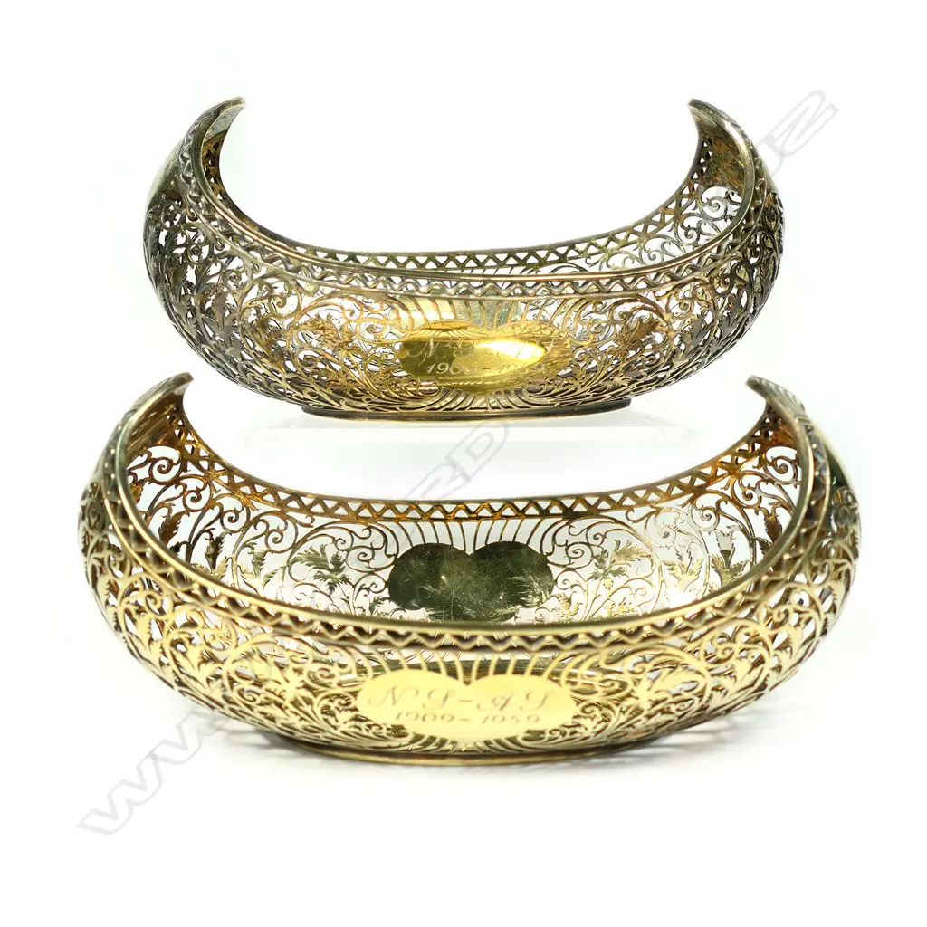 A pair of quality silver gilt boat form bonbon baskets Image 1++