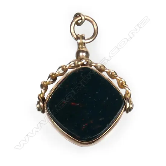 An early 20thC 9ct gold and hardstone fob spinner