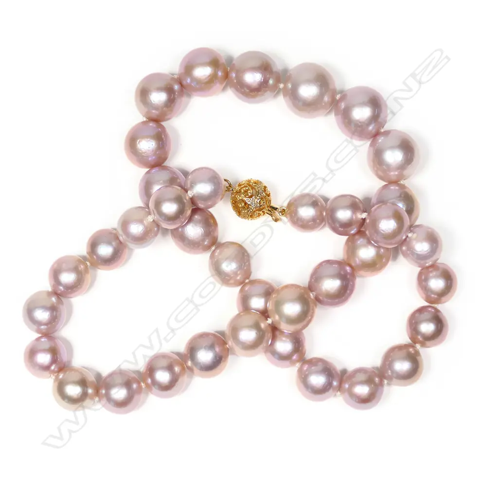 A cultured pearl necklace Image 1++