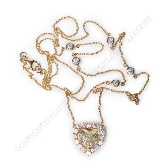 A 14ct gold and diamond heart necklace