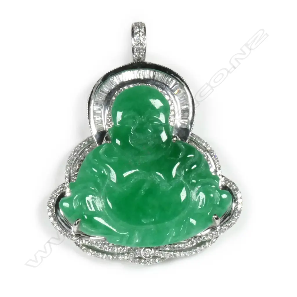 An impressive 18ct white gold jadeite and diamond Buddha pendant Image 1++