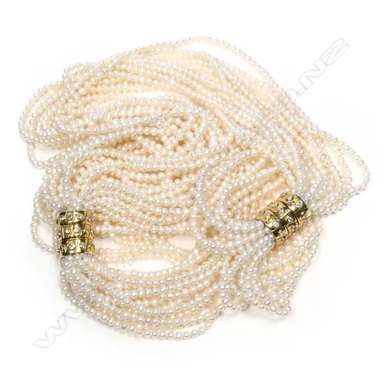 An impressive double multi-strand pearl necklace