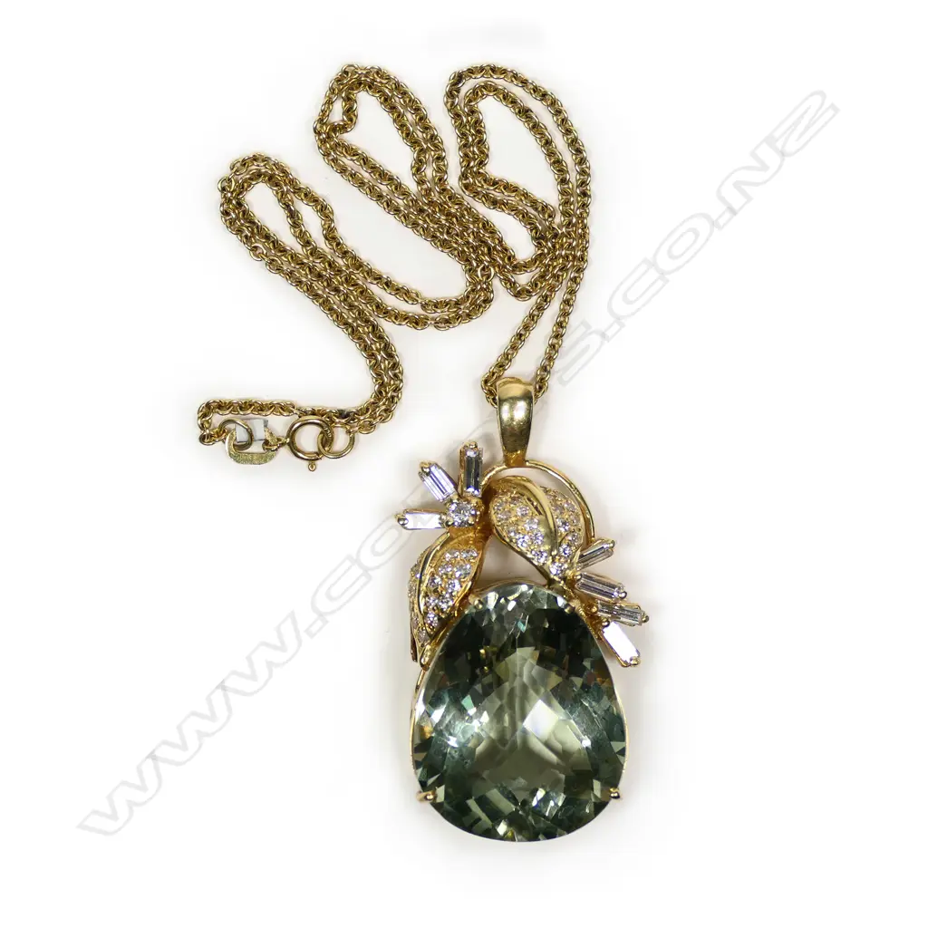 An 18ct yellow gold green quartz and diamond pendant on chain Image 1++