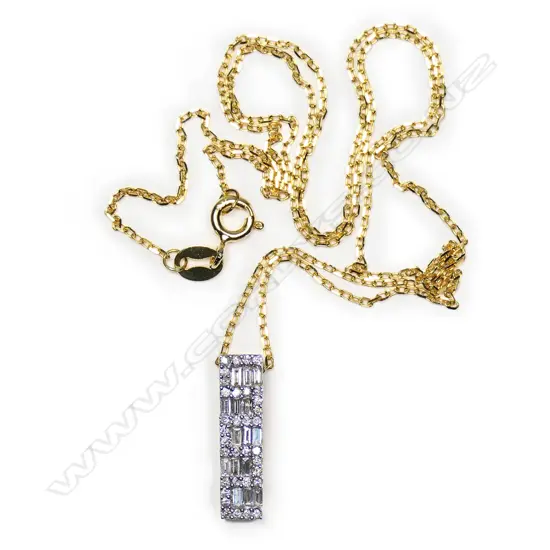 An 18ct yellow gold and diamond pendant on silver chain