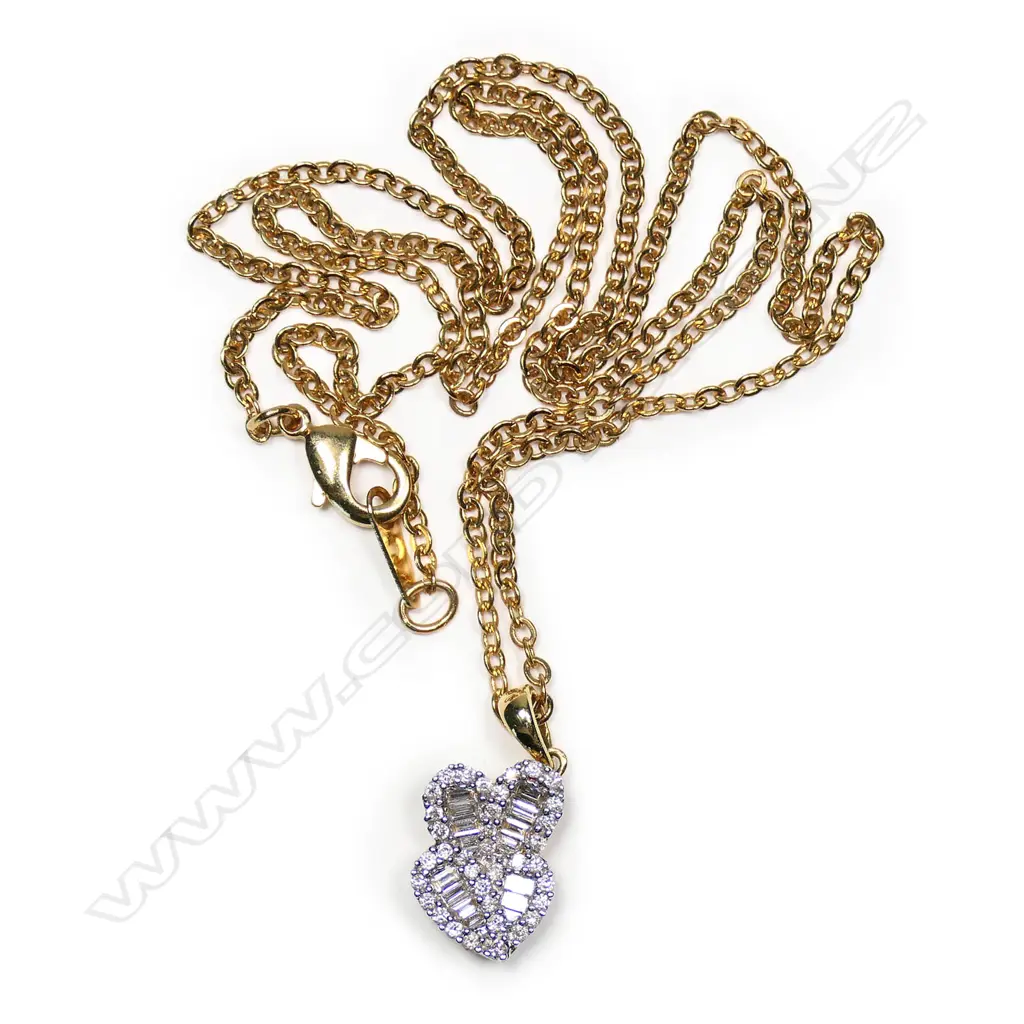 An 18ct yellow gold and diamond pendant Image 1++