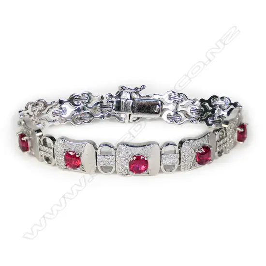 An 18ct white gold red spinel and diamond bracelet