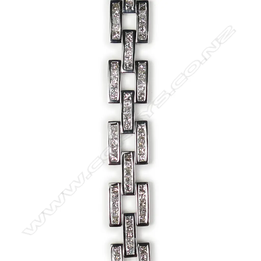 An 18ct white gold and diamond designer bracelet Image 1++