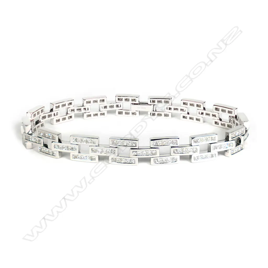 An 18ct white gold and diamond designer bracelet Image 1++