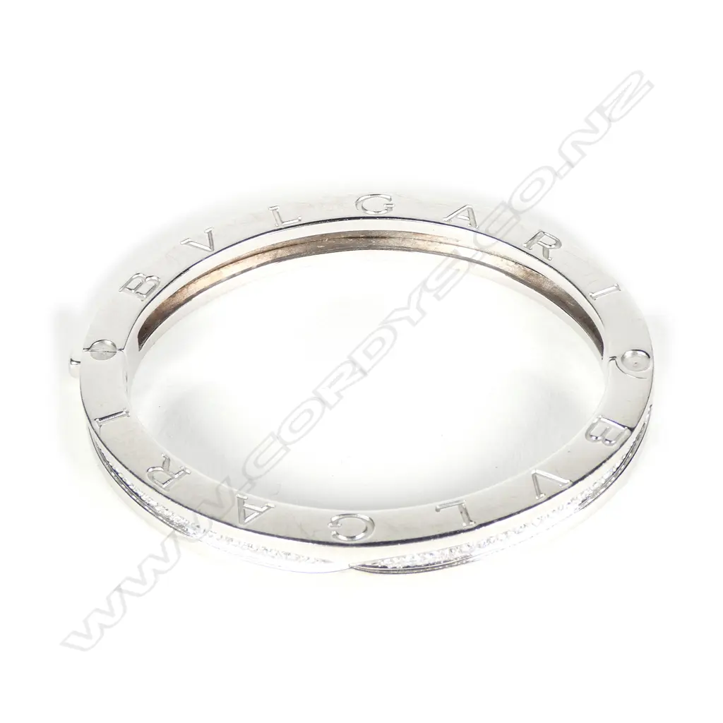 A Bvlgari 18ct white gold and diamond hinged bangle Image 1++