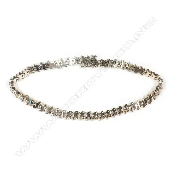 A 9ct yellow gold diamond set bracelet,