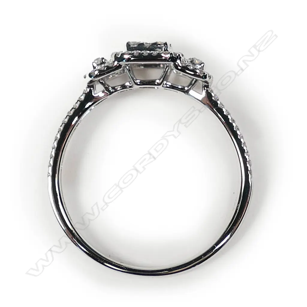 An 18ct white gold and diamond cluster ring Image 1++