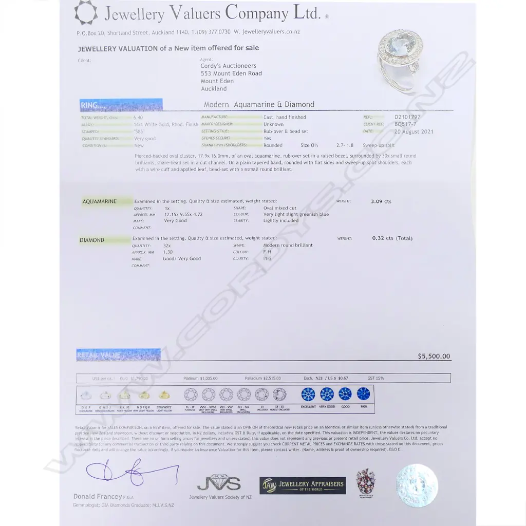 A 14ct white gold aquamarine and diamond ring Image 1++