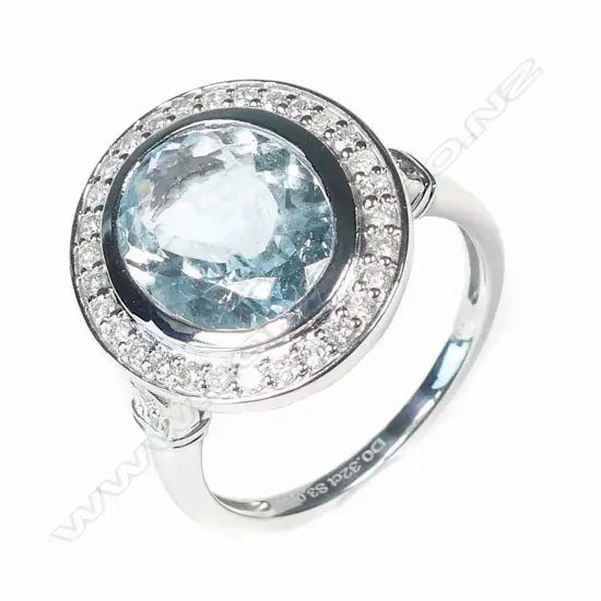 A 14ct white gold aquamarine and diamond ring