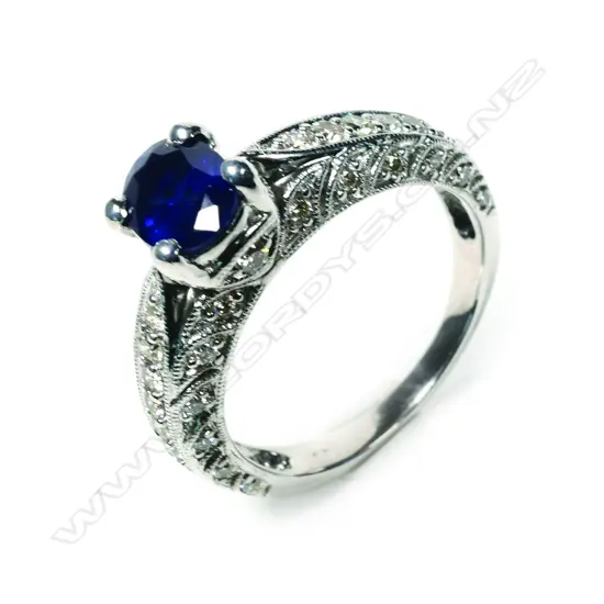 An 18ct white gold sapphire and diamond ring