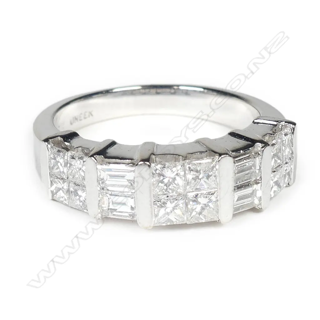 An 18ct. white gold and multi-diamond ring Image 1++