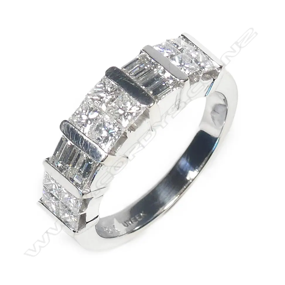 An 18ct. white gold and multi-diamond ring Image 1++