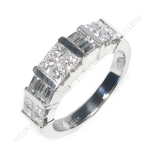 An 18ct. white gold and multi-diamond ring