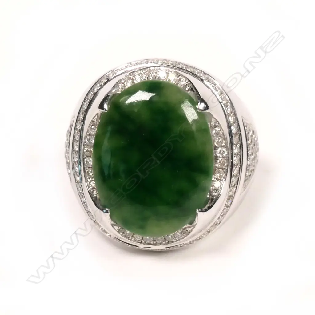 A large 18ct white gold jadeite and diamond ring Image 1++