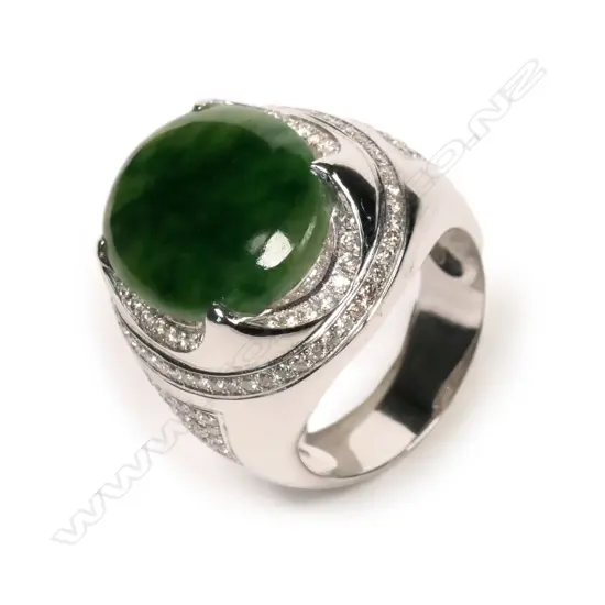 A large 18ct white gold jadeite and diamond ring